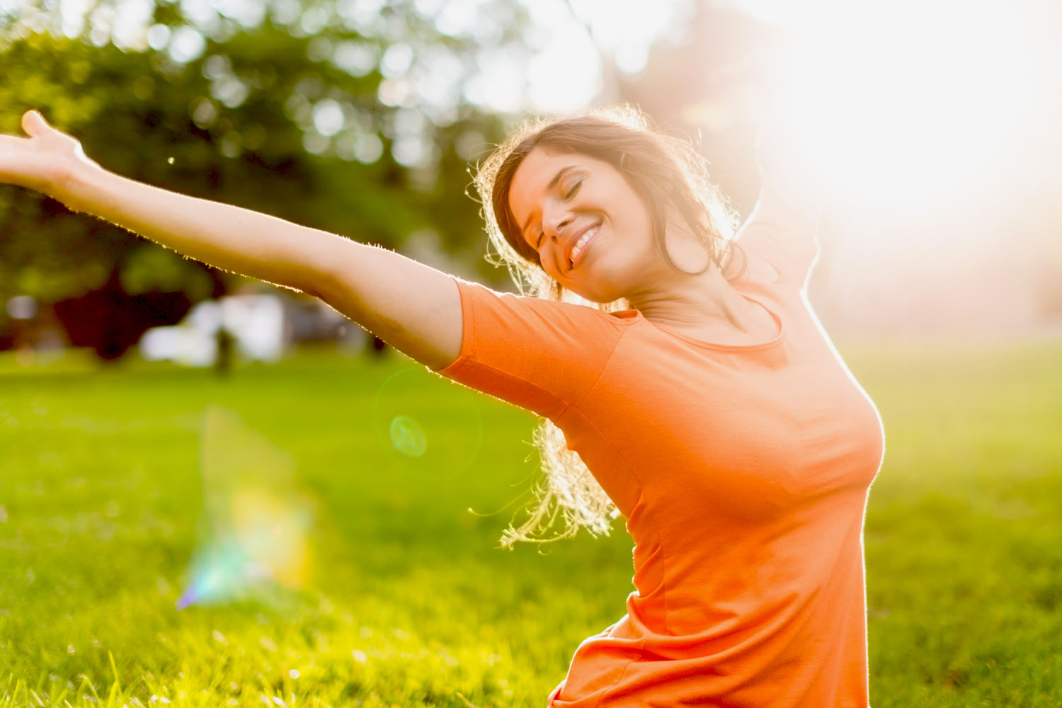 Women's health photo with happy woman in sunlight