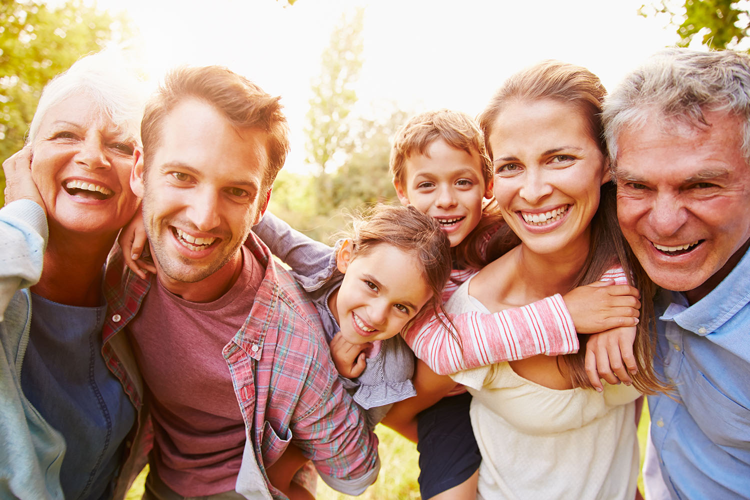 Family Medicine photo with happy family hugging