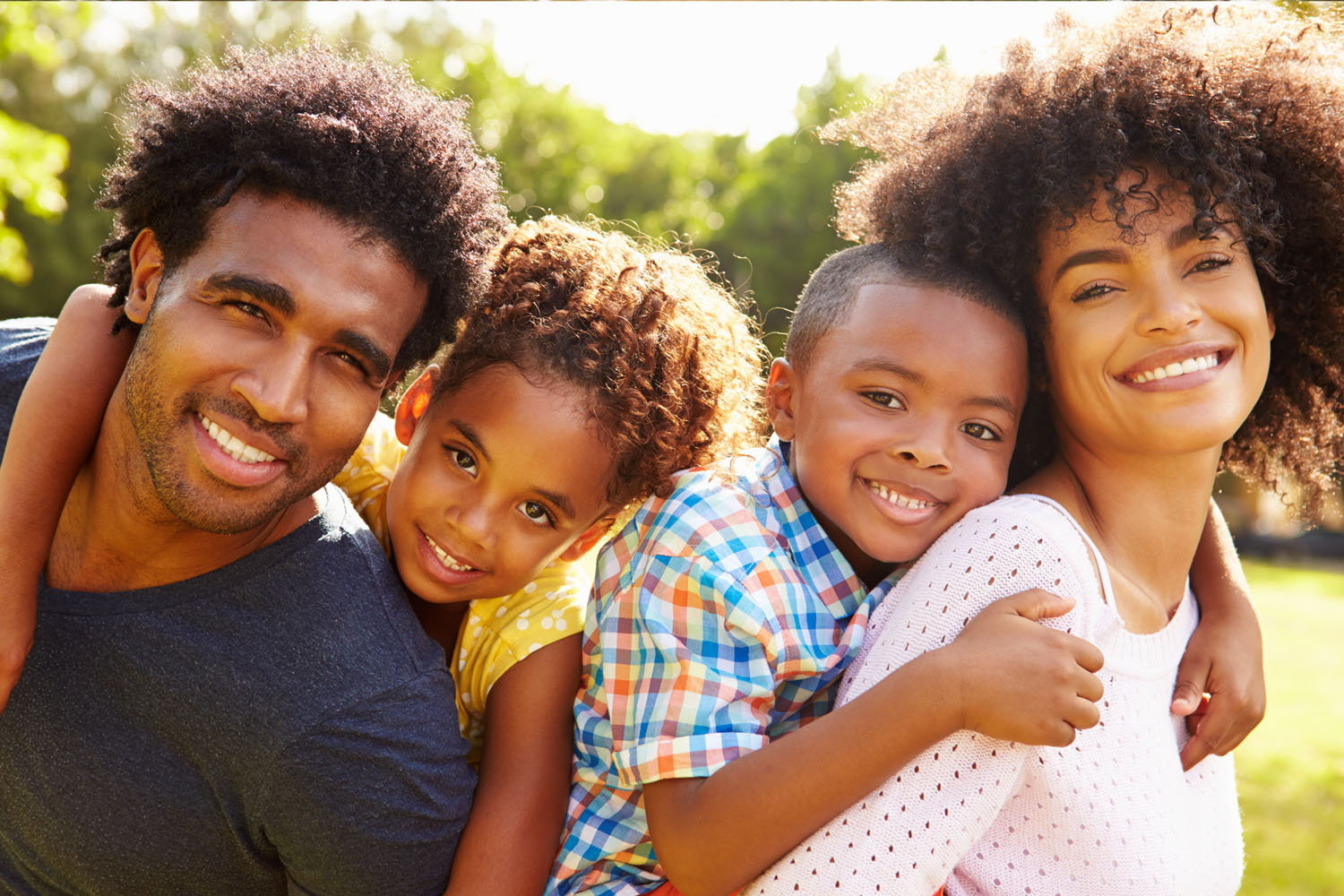 Forms and Resources photo with happy family hugging