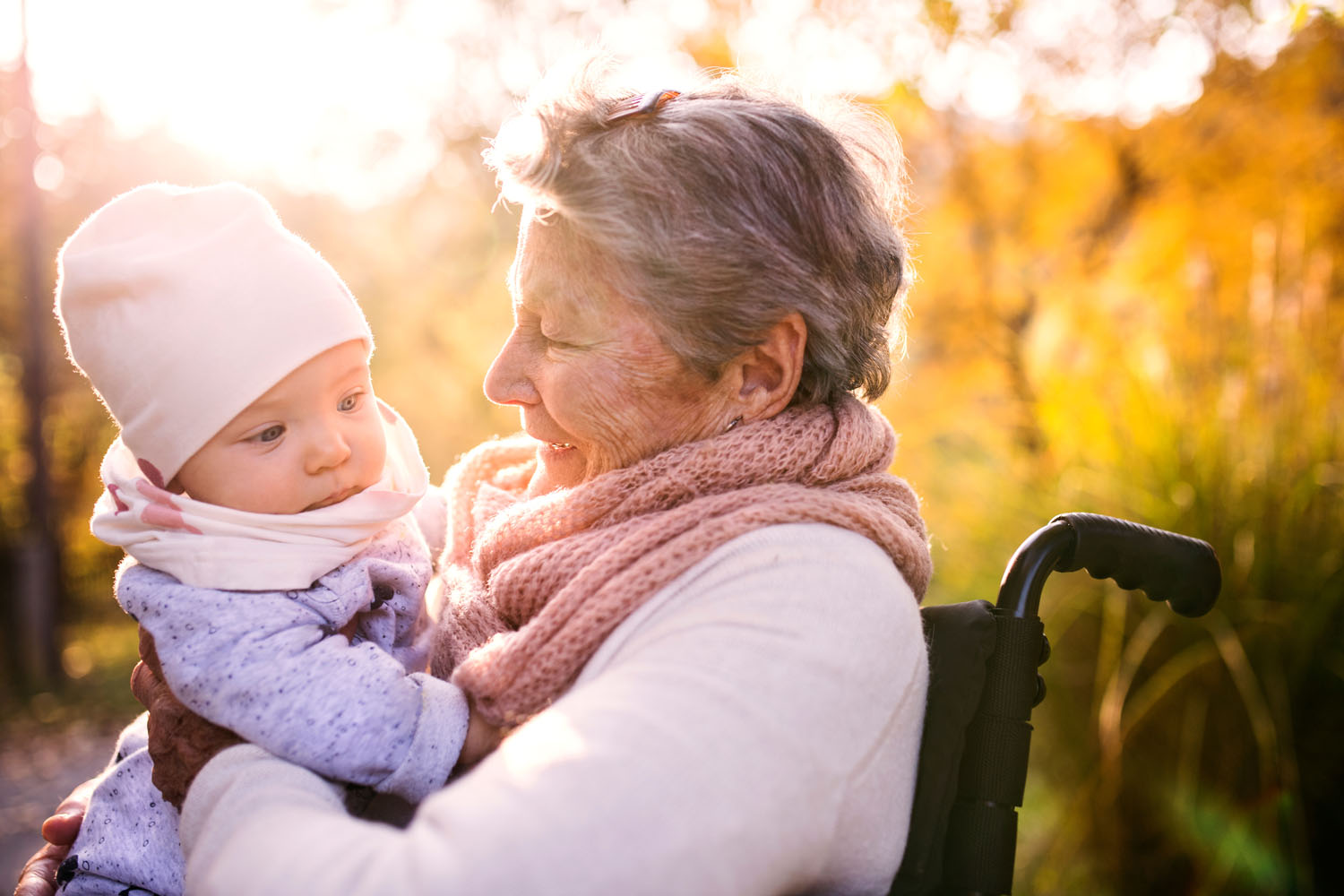 Geriatrics photo with happy elderly woman with great grandchild