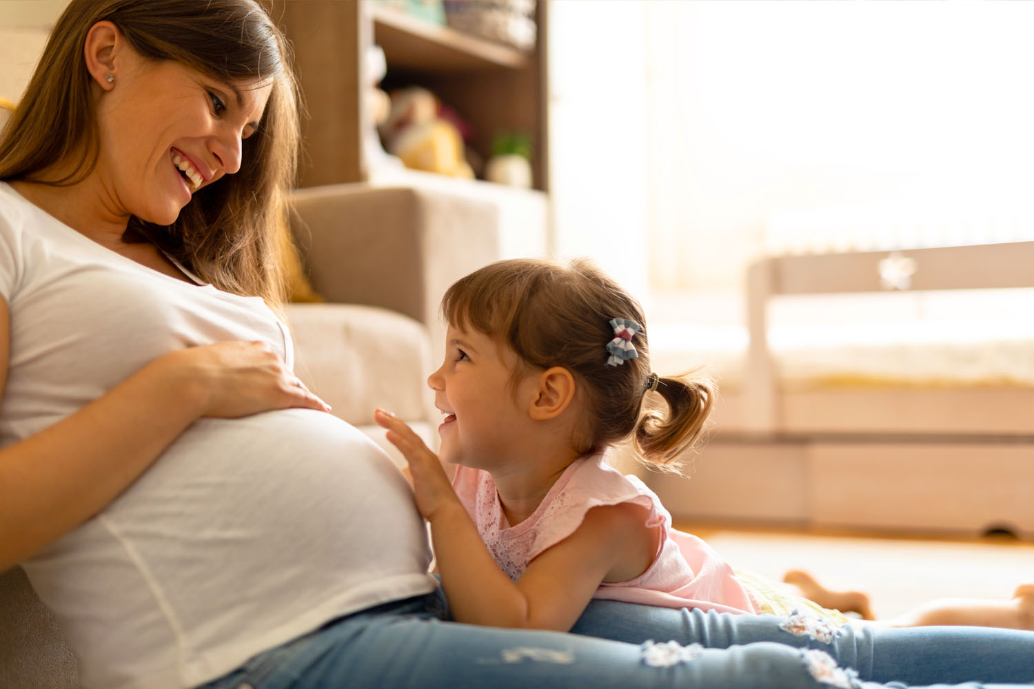 OB-GYN photo with pregnant mom and daughter